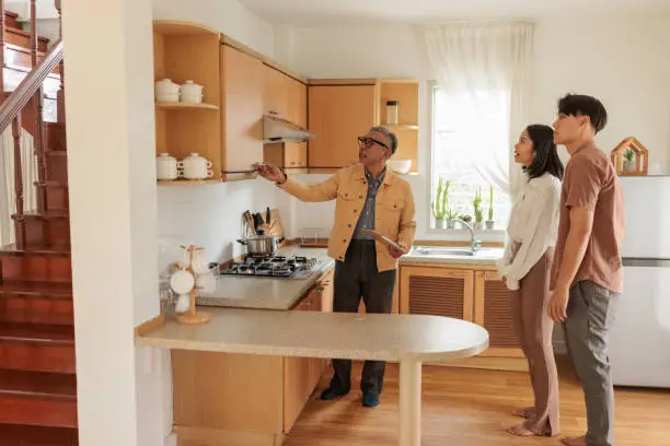 Closet designer consulting with homeowners during pantry closet project