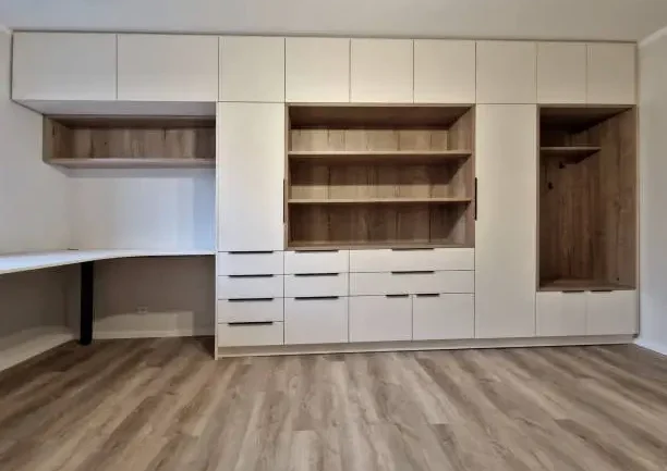 Built-in custom closet system in a mudroom