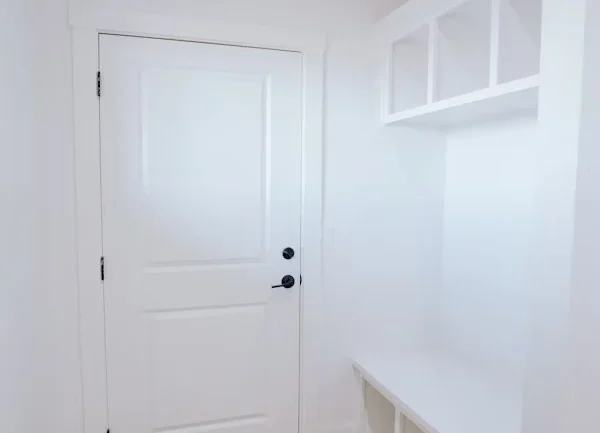 Small walk-in closet space with efficient plan use of vertical and corner spaces.