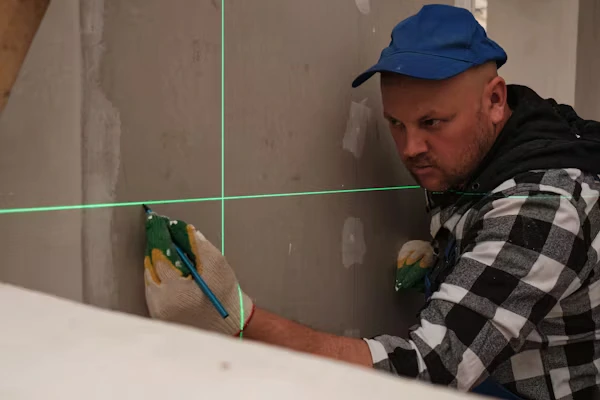 Custom closet systems being designed with precise depth measurements