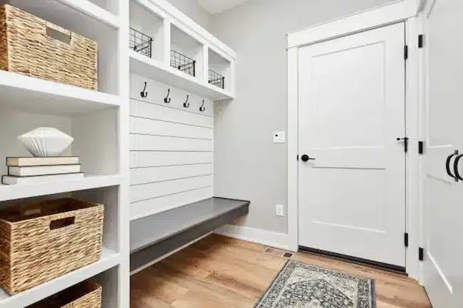 custom mudroom with built in benches cubbies hooks and cabinets